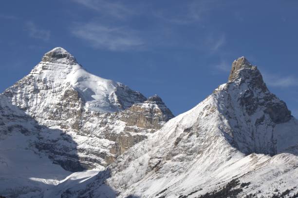 istock some very pretty looking snow covered mountains with a sky background 2155890845
