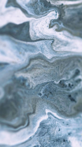 istock Paint spill ink water flow marble gray white blue 2155891785