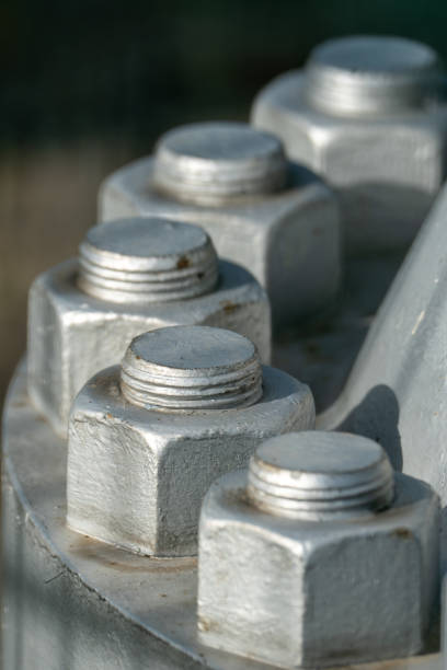 istock Close up of big nuts and bolts 2155892830