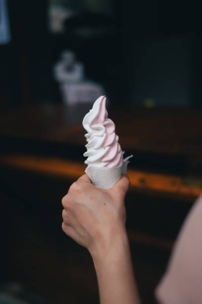 istock Person holding ice cream cone 2155892907