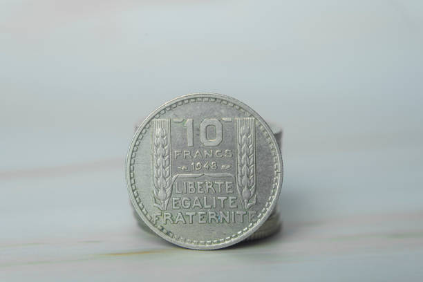Close-up of Swiss Franc coin value five CHF against gray background. Photo taken December 28th, 2023, Zurich, Switzerland.