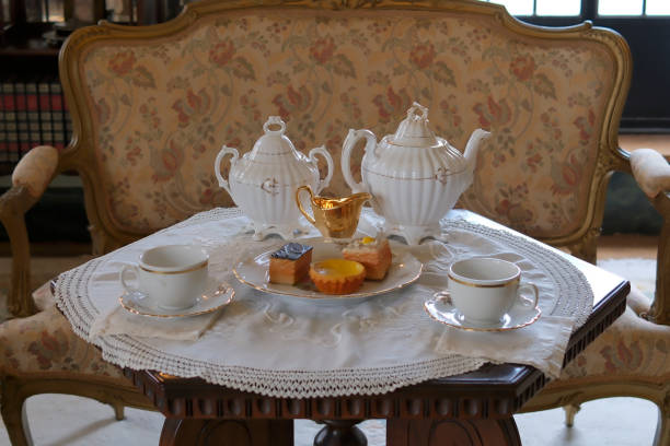 istock With tea, sugar, and cake on a table, close-up view 2155894213