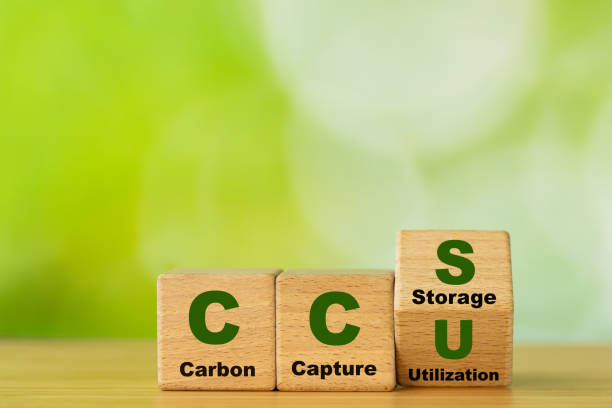 istock Wooden cubes form the symbol CCU (carbon capture utilization) and CCS (carbon capture storage). Environmental Business concept,  Net zero action, Save energy, green energy, reduce carbon footprint 2155894918