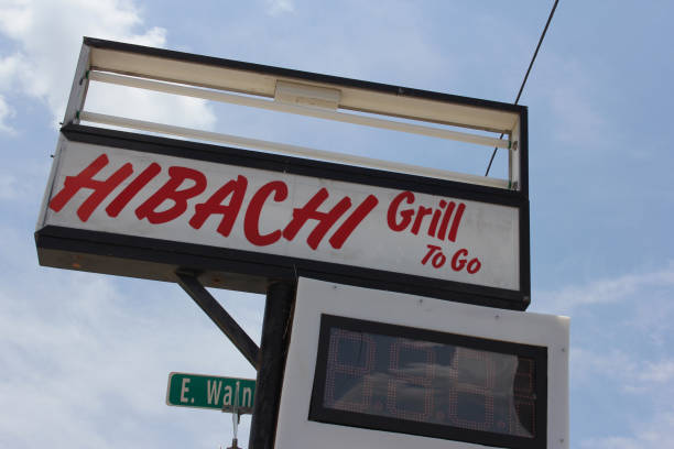istock Hibachi grill takeout sign against a blue sky 2155895375