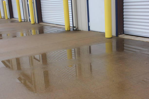 istock Wet street with small puddles after rain 2155895382