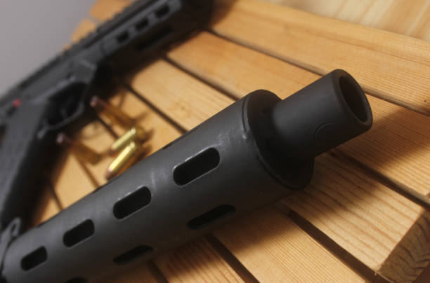 A man pointing the shotgun.