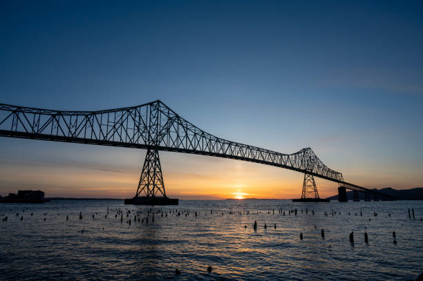 AstoriaMegler Bridge spanning the Columbia River between Oregon and Washington at sunset.