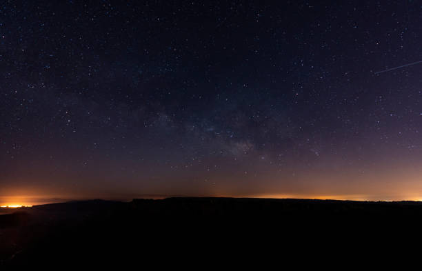 istock Night view from hilltop with shiny stars 2155896990