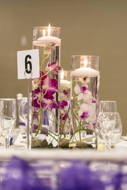 Flower arrangement on a dining table at a wedding reception