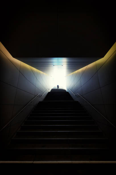 istock Man on staircase in Hamburg subway station 2155900315