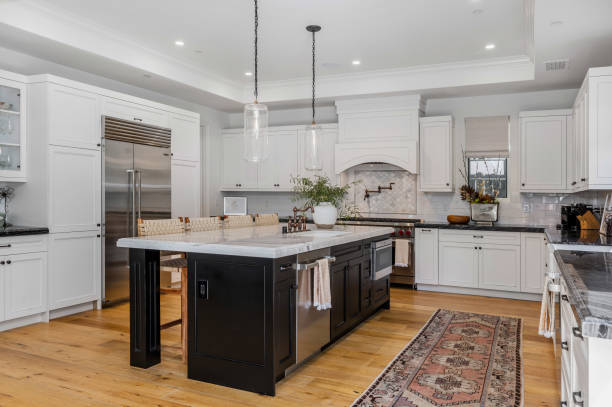 istock a kitchen with a table that has chairs around it and a counter top that is 2155900795