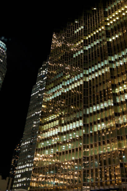 istock Skyscrapers at city crossroads at night 2155901475