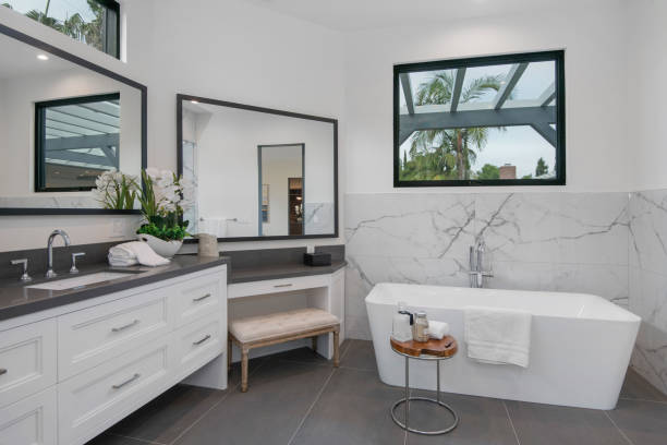 istock this is a large modern bathroom with glass windows and a white tub 2155901666