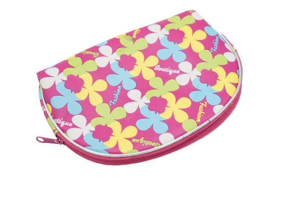 istock pretty pink and colorful toiletry bag on a white background 2155901934