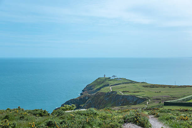 istock Dublin, Ireland - seaside under blue sky and white clouds 2155903792