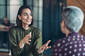 two-businesswomen-talking-in-the-office.jpg?b=1&s=170x170&k=20&c=ScTqSmX1o8L7jRNLpzYklcRpSuIzGF_b0rCKqP-aLpA=