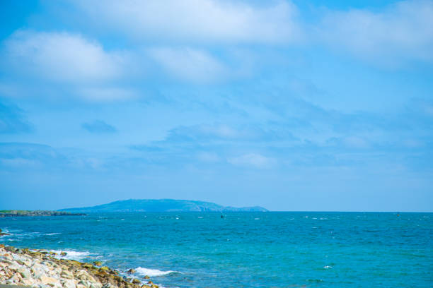 Dublin, Ireland - seaside under blue sky and white clouds