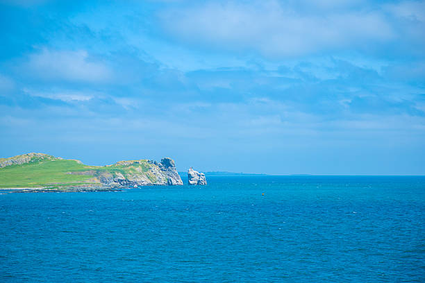 Dublin, Ireland - seaside under blue sky and white clouds