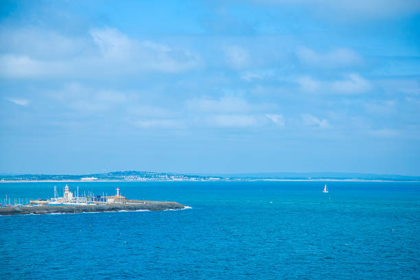 Dublin, Ireland - seaside under blue sky and white clouds
