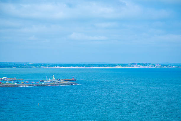 Dublin, Ireland - seaside under blue sky and white clouds