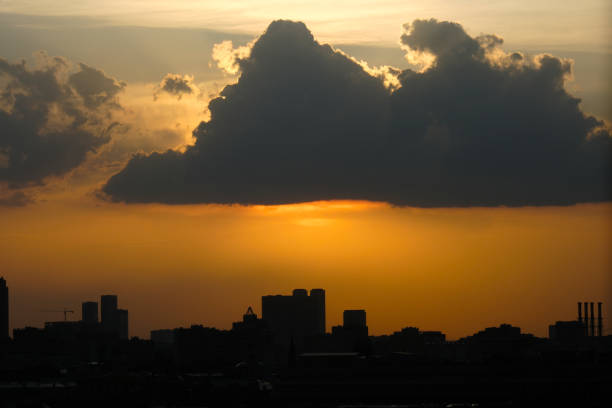 Landscape at sunset. Tragic gloomy sky. Panorama. Crimson twilight.