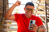 a-happy-young-man-wins-with-an-online-betting-app.jpg?b=1&s=170x170&k=20&c=cPSOfu1XO28YCO0aJvwzpm4LpKetufqSNZ5M8zC_USI=