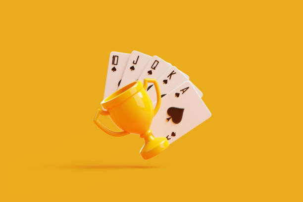 Five different playing cards standing on white table