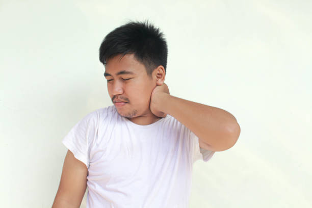 istock Tired upset young man suffering from pain, muscle spasm at workplace. 2155907938