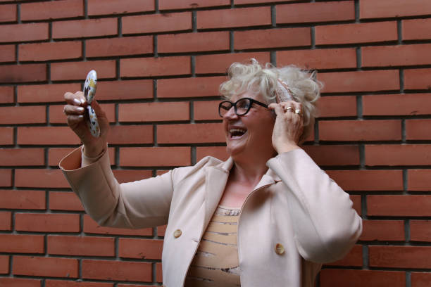 istock Modern senior woman on street 2155911057