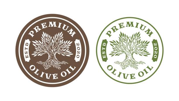 istock olive oil tree labels and badges isolated on vintage design. 2155911317