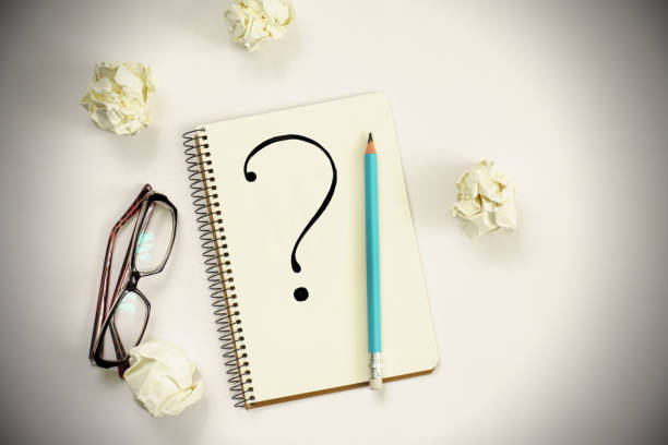 istock notebook with phone, glasses and pencil on a white ground. design concept. 2155911430