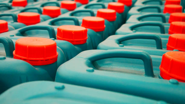 istock Many beautiful plastic containers with bright red lids standing in a row 2155911908