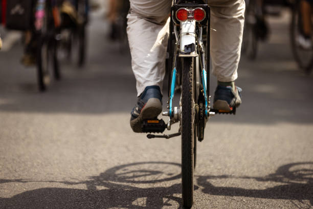 Yogyakarta, Indonesia - January, 27 2025 : Locals enjoy cycling around the city in the morning, breathing in fresh air and taking in beautiful views, creating an active and healthy atmosphere.
