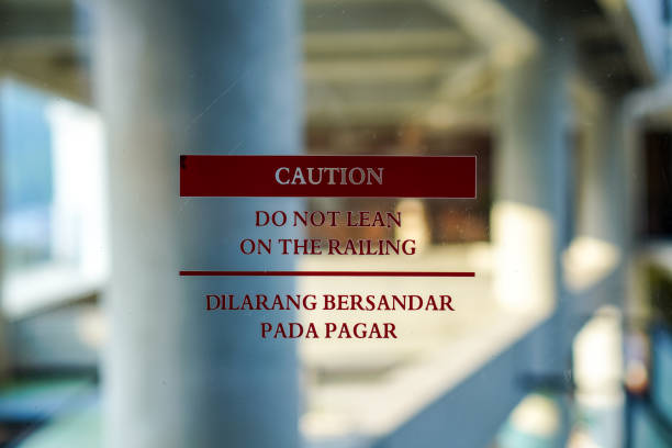 istock The label warns not to lean against the railing 2155915261