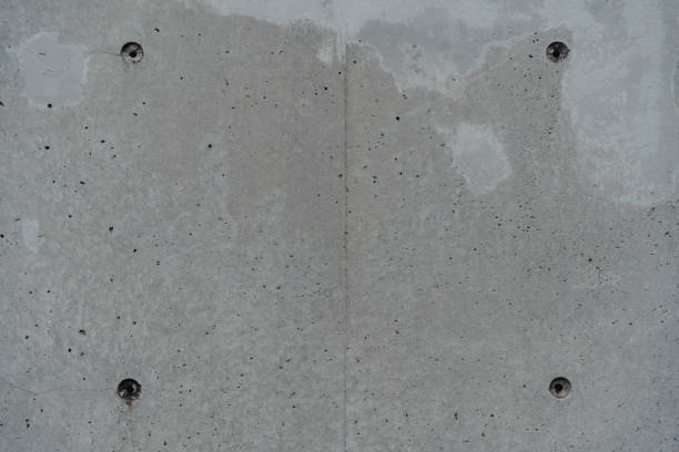istock Raw Concrete Wall Texture with Holes and Cracks 2155923145