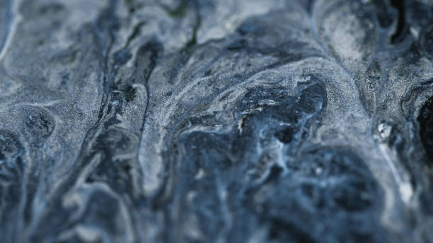 istock Glitter fluid texture shimmering ink silver paint 2155928661