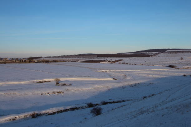 istock A snowy landscape with a blue sky 2155928881