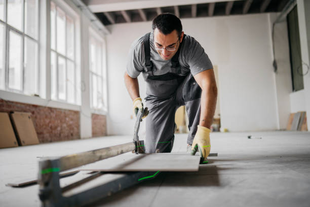 istock Putting glue on tiles 2155930050