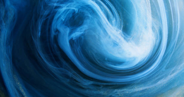 istock Smoke swirl glitter vortex blue paint water splash 2155931660