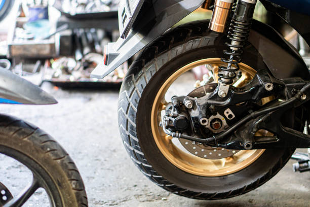 istock Motorcycle Rear Wheel and Suspension in Workshop 2155947671