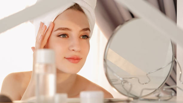 istock moisturizing care glowing skin woman pure face 2155948320