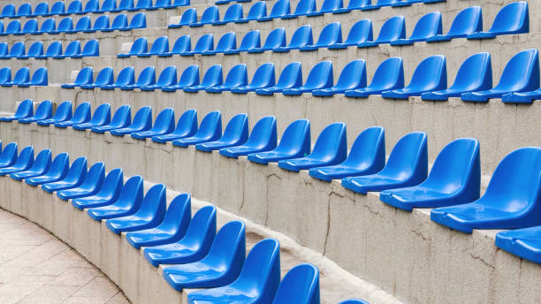 istock Plastic blue seats on street auditorium or stadium. No people, side view, perspective 2155954424