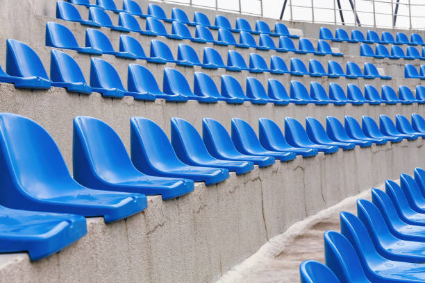 istock Plastic blue seats on street auditorium or stadium. No people, side view, perspective 2155954426