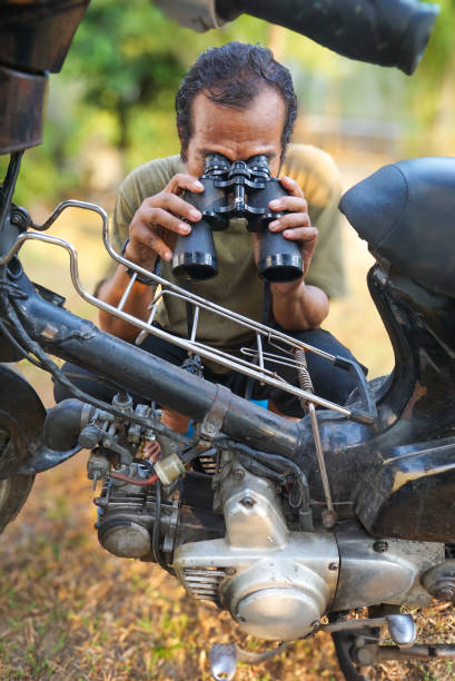 istock Mechanic working on a motorbike, vehicle breakdown concepts. 2155956322