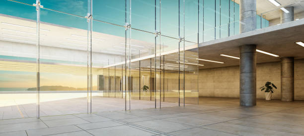 istock 3D Modern glass wall office interior overlooking seaside 2155962888