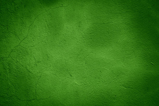 istock Background of painted rough stucco green wall. 2155963289