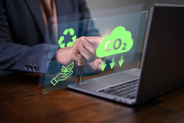 istock Reduce co2 emission. man using software to lower CO2 emissions to limit global warming and climate change, 2155968891