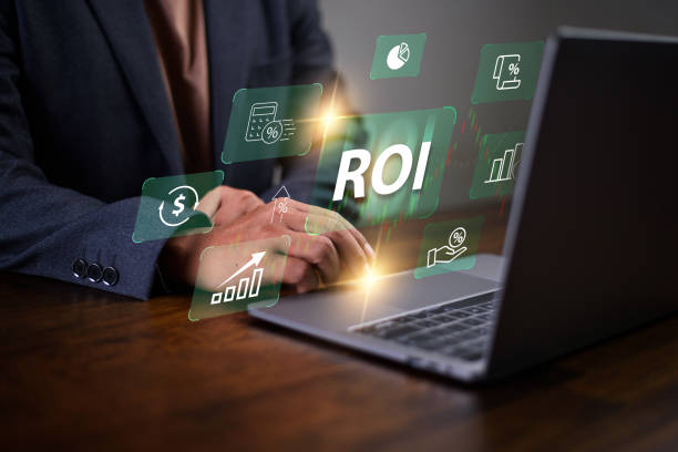 istock Return on investment (ROI) , Businessman using a sofware to analysis investment to get high  return. 2155968899
