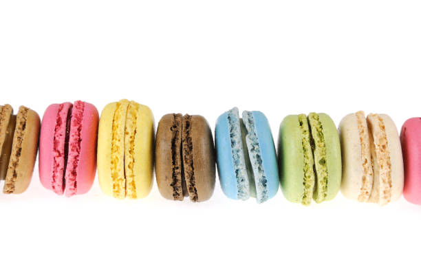 istock Colorful macarons isolated on the white background 2155969293