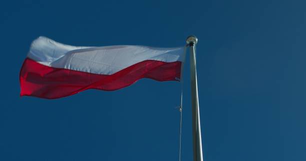 istock Polish red and white flag on the mast 2155969428